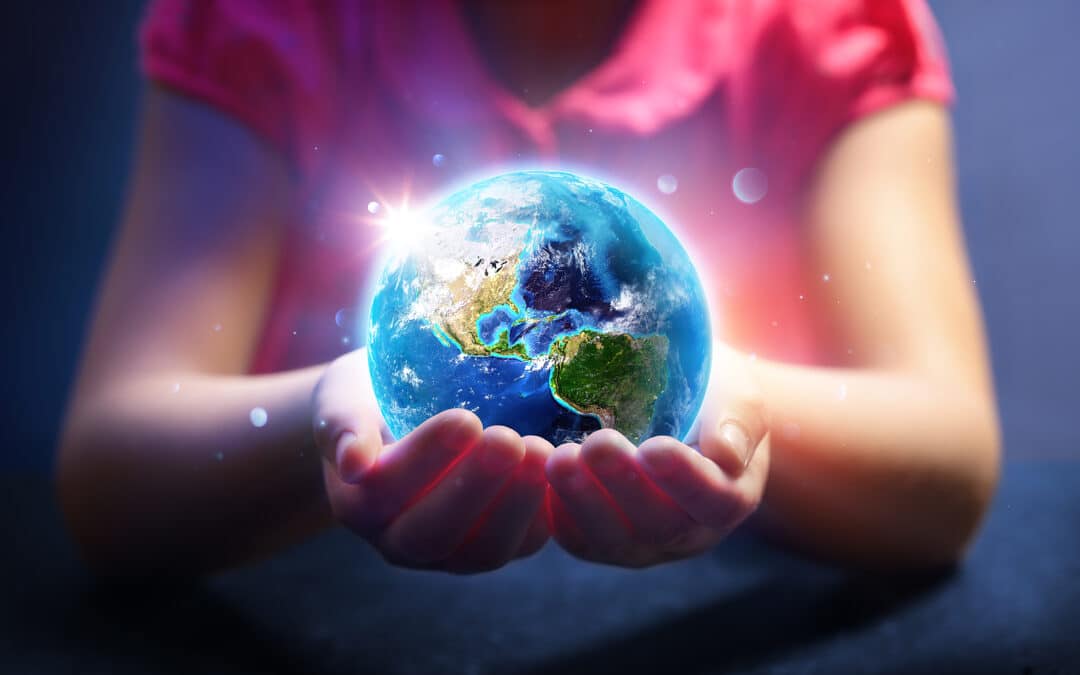 Child holding the world in their hands. Signifies a child with dyslexia taking on the world and succeeding. This dyslexia fact sheet will help your child find their world.